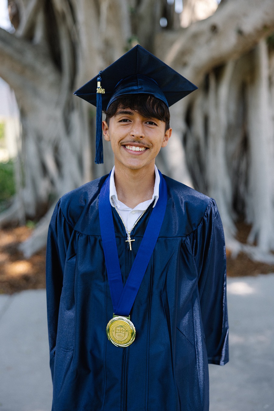 Carlos Aguilar-Mancera, SCF Graduate, in his graduation regalia. 
