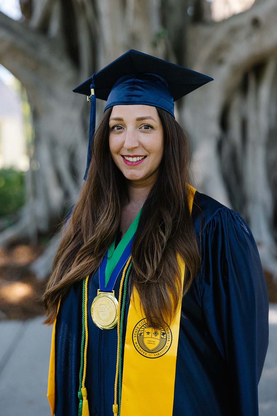 Jana Andresia Maynard, SCF Graduate, in her graduation regalia. 