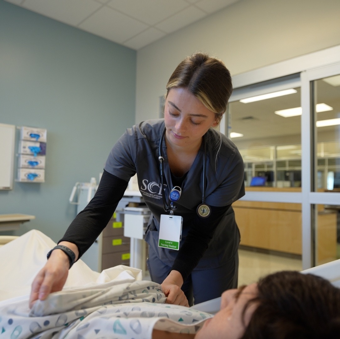 Tuesday, July 28, 2026 at 10:00 a.m. Join us for our upcoming RN-BSN Information Session. Image description: SCF Nursing student providing care at the state-of-the-art Clinical Simulation Center featuring advanced AI-powered animatronic mannequins.